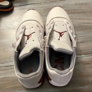 White Nike Jordan’s maroon has laces not on them used a lot but cleaned size 7.5